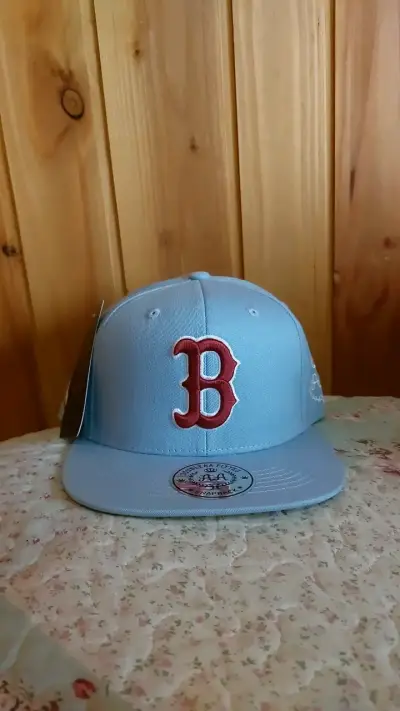 Gorra azul con logo bordado - miniatura 1
