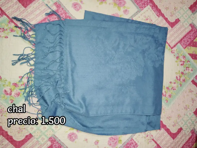 Chal azul con flecos