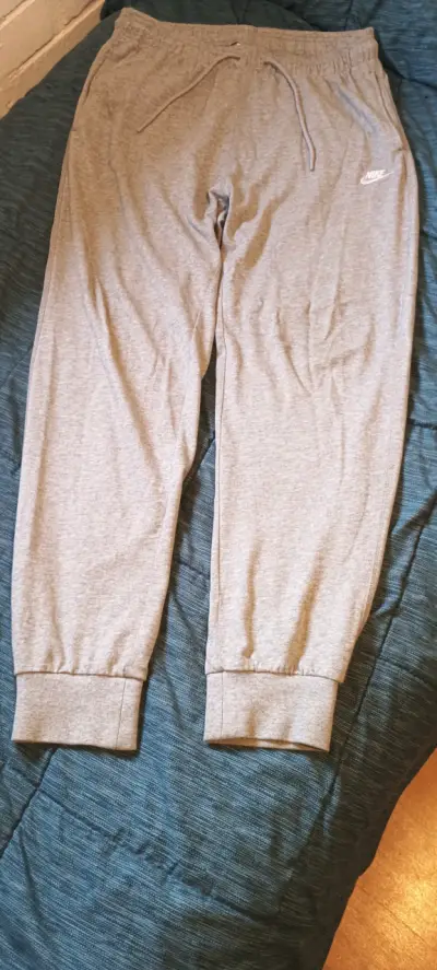 Pantalones deportivos grises Nike para hombre - miniatura 1