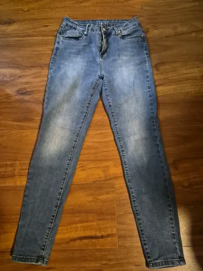 Jeans ajustados de mezclilla azul para mujer - miniatura 1