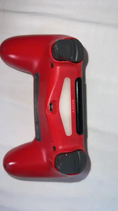 Control inalámbrico rojo para PlayStation 4 - miniatura 3