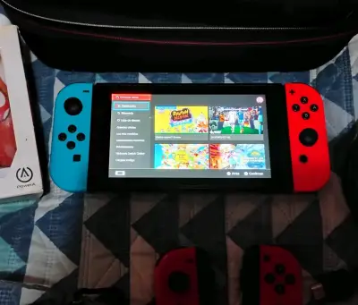 Consola Nintendo Switch con Joy-Con Azul y Rojo - miniatura 1