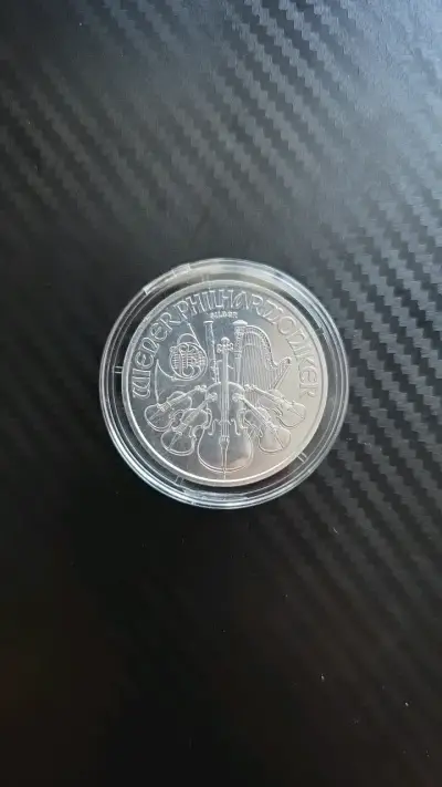 Moneda de plata Wiener Philharmoniker en cápsula - miniatura 1