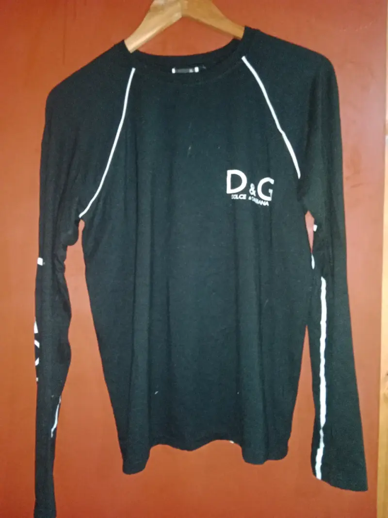 Polera negra con diseño "De Puta Madre 69" - 2