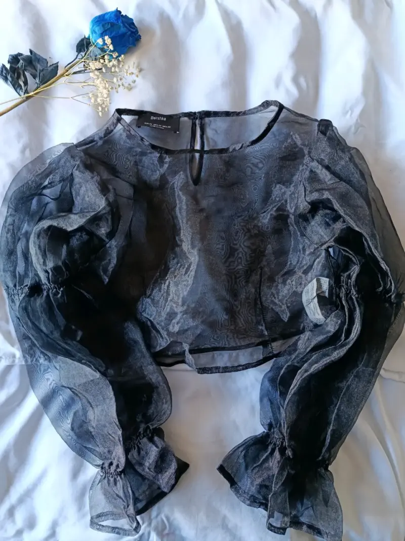 Blusa transparente negra