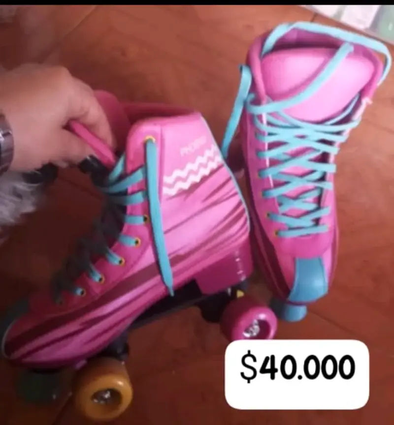 Patines de cuatro ruedas rosados y celestes - 2