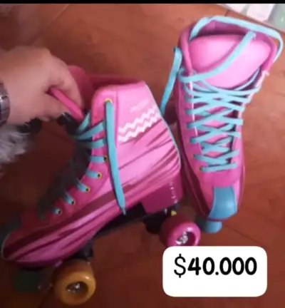 Patines de cuatro ruedas rosados y celestes - miniatura 2