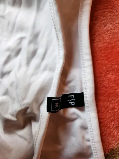 Top blanco sin mangas para mujer - miniatura 3