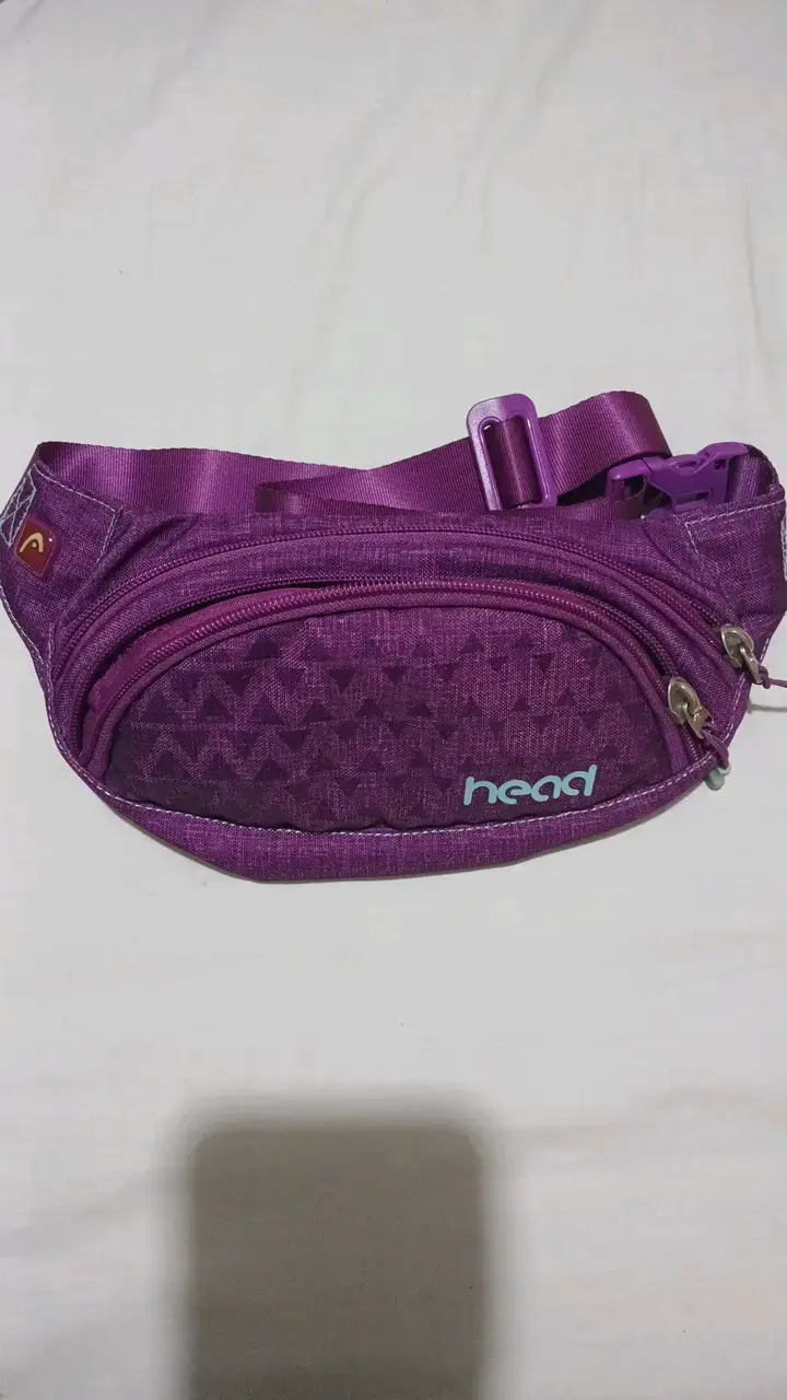 Riñonera deportiva morada marca Head