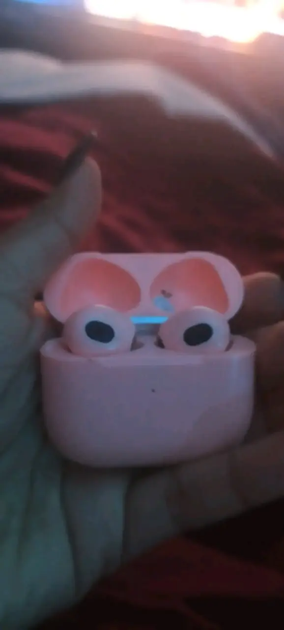 Auriculares inalámbricos rosa con estuche