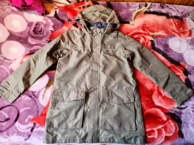 Parka impermeable verde con capucha - miniatura 1