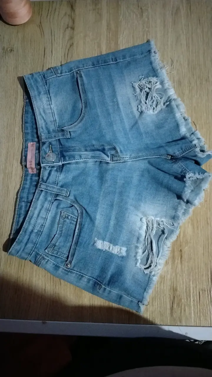 Shorts de mezclilla desgastados para mujer - 1