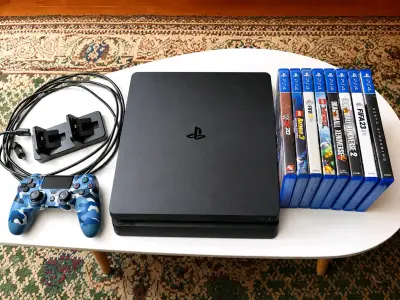 PlayStation 4 Slim con 8 juegos y control original - miniatura 1
