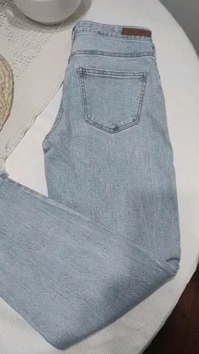 Jeans celestes rasgados para mujer Americanino - miniatura 1