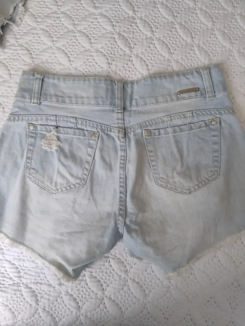 Shorts de mezclilla desgastados para mujer - 3