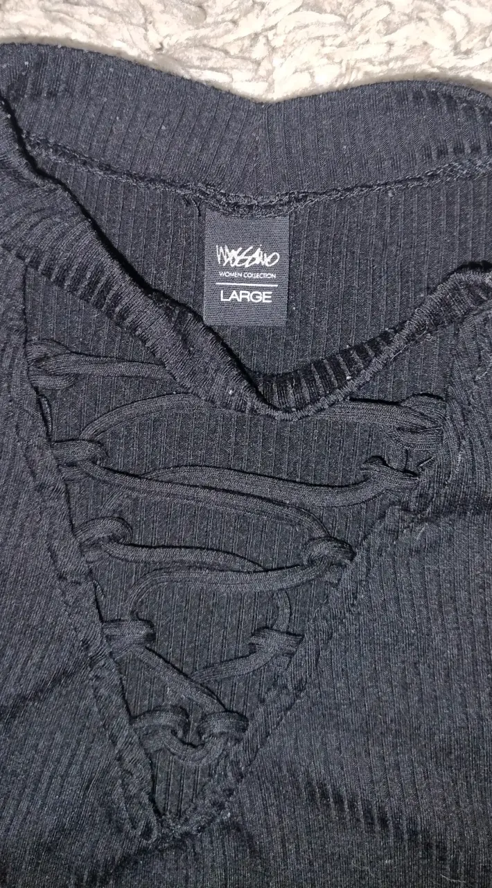 Polera negra con diseño trenzado talla L - 2