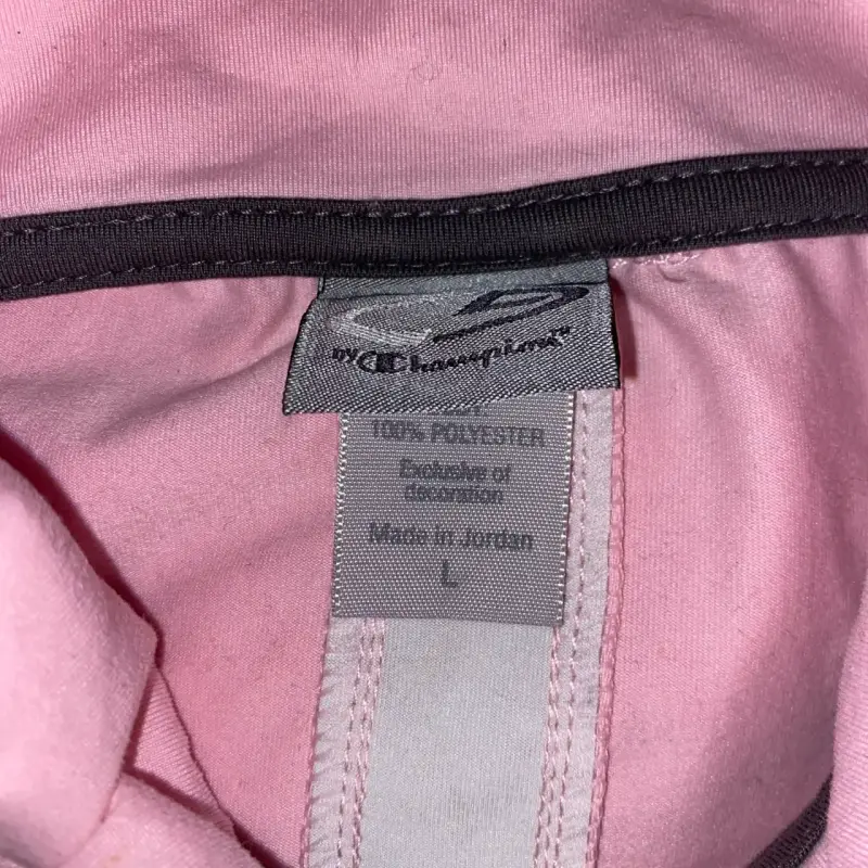 Polerón deportivo rosa con cierre y logo de tenis - 6