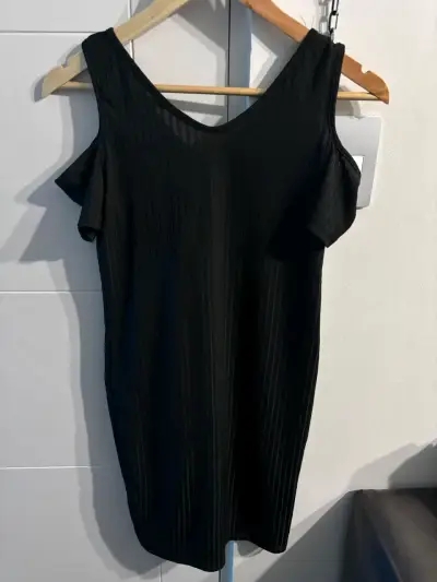 Chaqueta acolchada de mujer y vestidos - miniatura 5