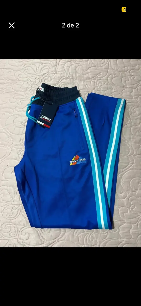 Pantalones deportivos Tommy Jeans azul con franjas - 1