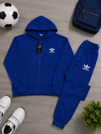 Conjunto deportivo gris con capucha Puma - miniatura 2