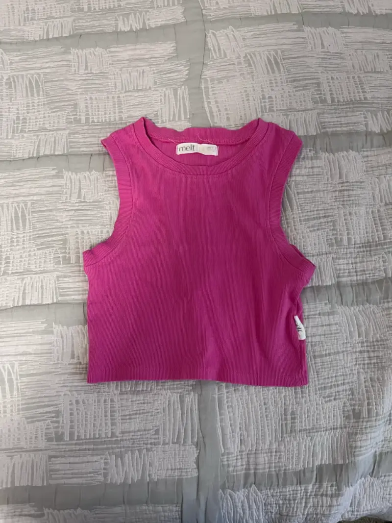 Top sin mangas fucsia Melt 12