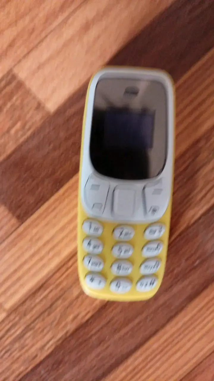 Teléfono móvil retro amarillo ultra mini - 2