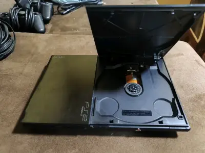Consola PlayStation 2 Slim con controles y cables - miniatura 2