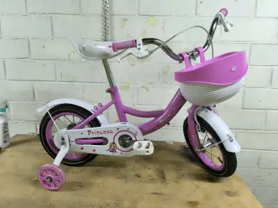 Bicicleta infantil rosa con canasto y rueditas - miniatura 1