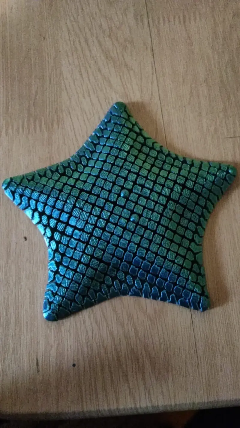 Juguete en forma de estrella azul