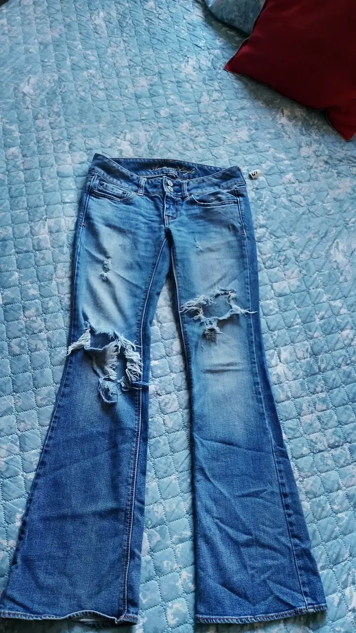 Jeans acampanados desgastados para mujer - 1