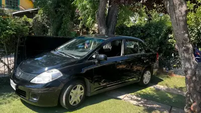 Nissan Tiida 2014, buen estado, Siempre Particular - miniatura 2