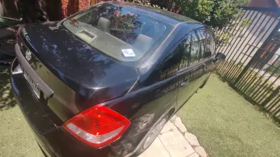 Nissan Tiida 2014, buen estado, Siempre Particular - miniatura 4