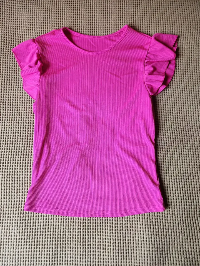 Polera fucsia con volantes en mangas - 1