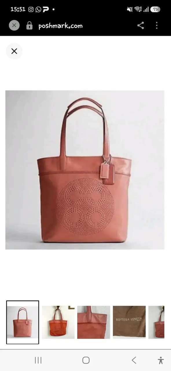 Bolso de cuero Coach color coral elegante - 1