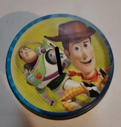Lata  alcancía  caramelos Toy Story 3 Ambrosoli - miniatura 1