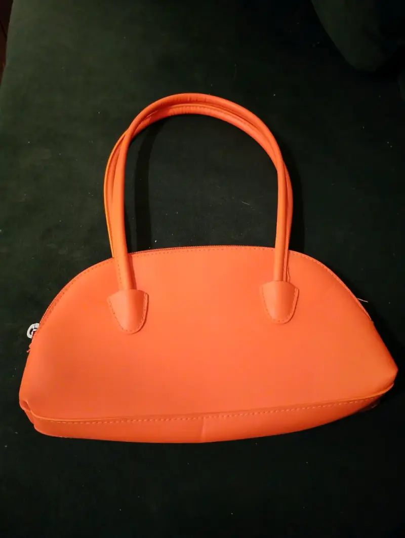 Bolso de mano naranja elegante