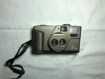 Cámara Hanimex 35mm Dual Lens Vintage - miniatura 1