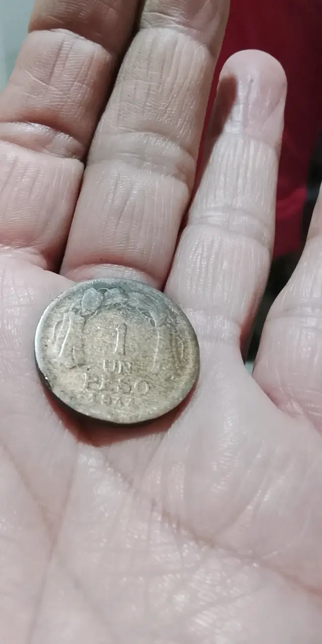 Moneda antigua de un peso 1960 - 1