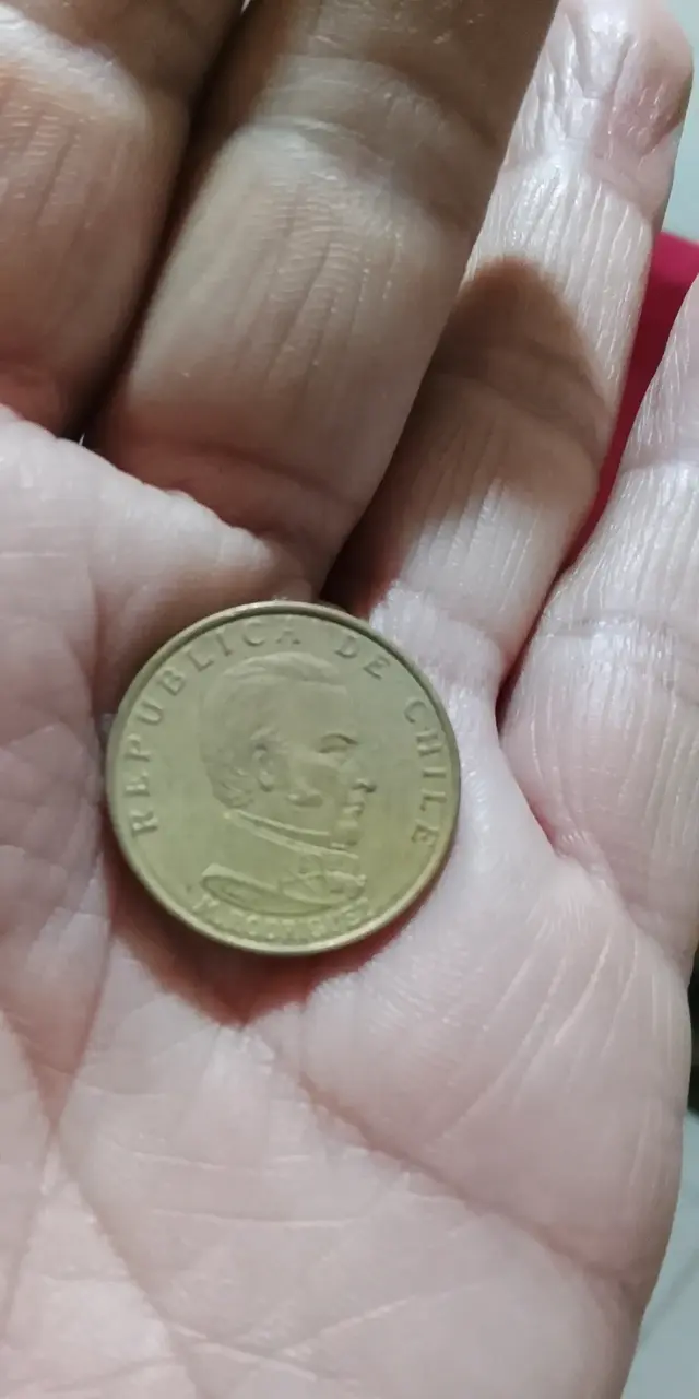 Moneda antigua de un peso 1960 - 2