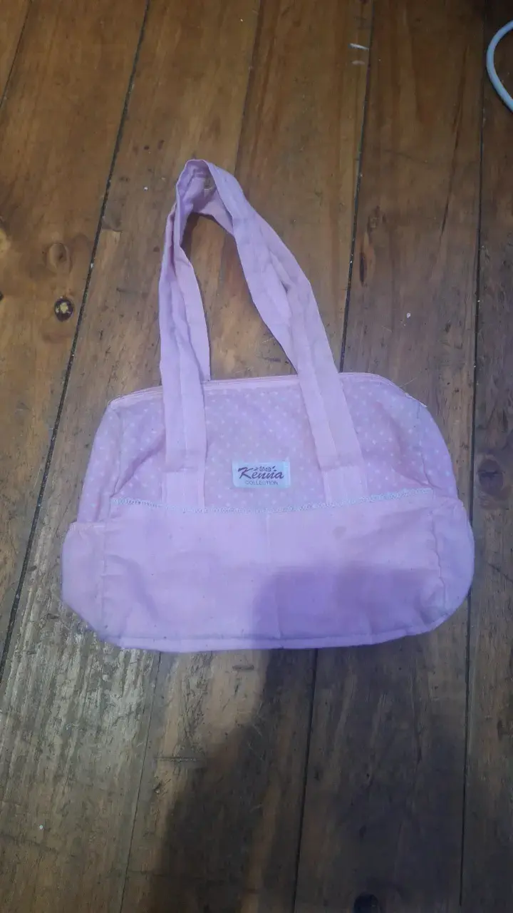 Bolso de mano rosado para mujer