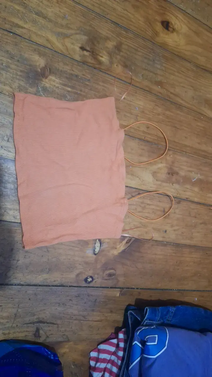 Top sin mangas color naranja para mujer