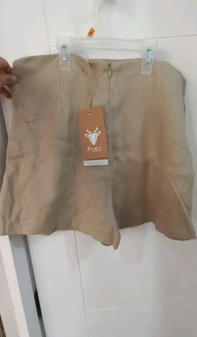 Shorts de lino beige con detalle lateral - miniatura 1