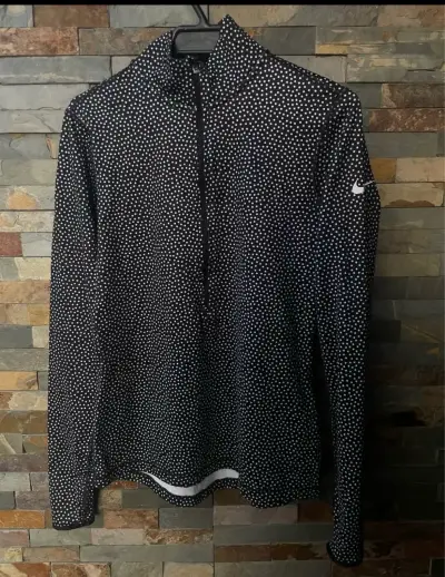 Polera Nike Pro Dri-FIT de lunares para mujer - miniatura 1