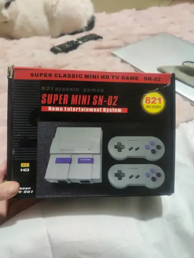 Consola Retro Super Mini SN-02 con 821 Juegos - miniatura 1