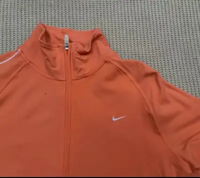 Chaqueta deportiva Nike Fit naranja para mujer - miniatura 3