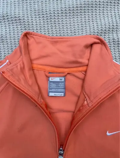 Chaqueta deportiva Nike Fit naranja para mujer - miniatura 4