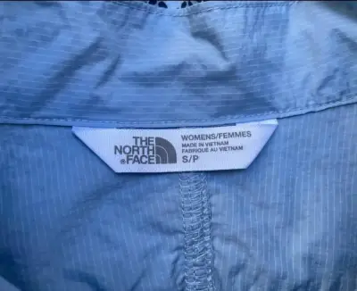 Chaqueta deportiva azul The North Face para mujer - miniatura 4