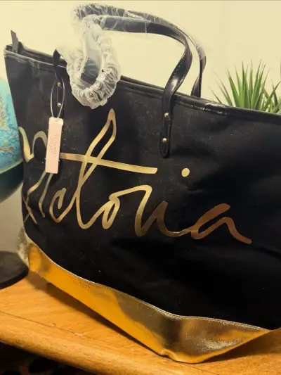 Bolso de mano Victoria's Secret negro y dorado - miniatura 3