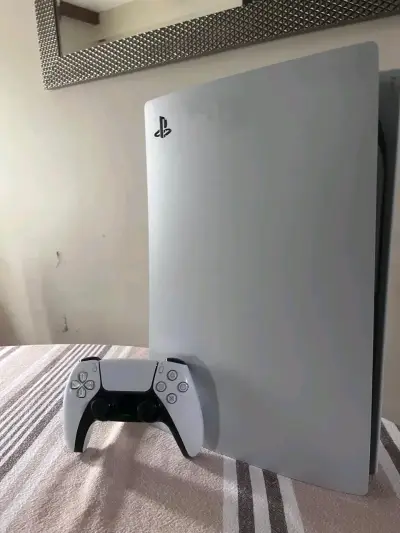 Consola PlayStation 5 con Control y Juegos - miniatura 1