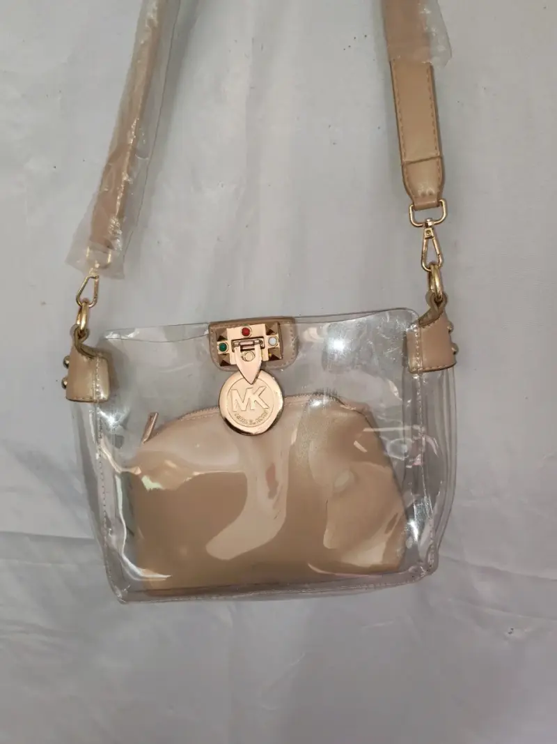 Cartera transparente con detalles dorados MK - 3